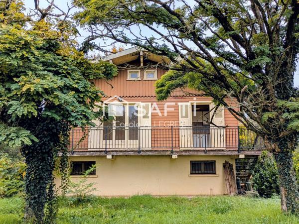Maison type chalet au bord de la rivière d'ain