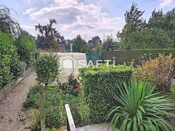 Pavillon construit sur sous sol complet, 5 pièces à la campagne à 8 min de Saint-Quentin sans aucun travaux à prévoir.