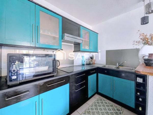 Appartement T3 avec un balcon et 2 places de parking privatives