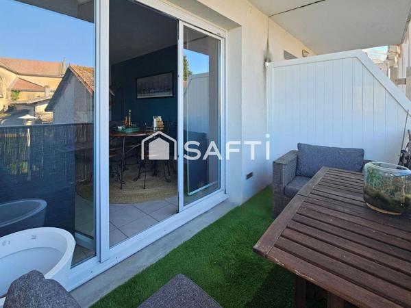 Appartement T3 avec un balcon et 2 places de parking privatives