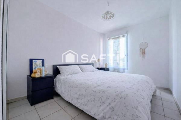 Appartement T3 avec un balcon et 2 places de parking privatives