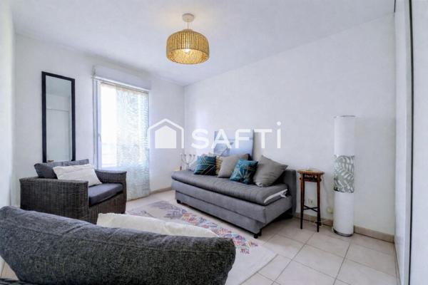 Appartement T3 avec un balcon et 2 places de parking privatives
