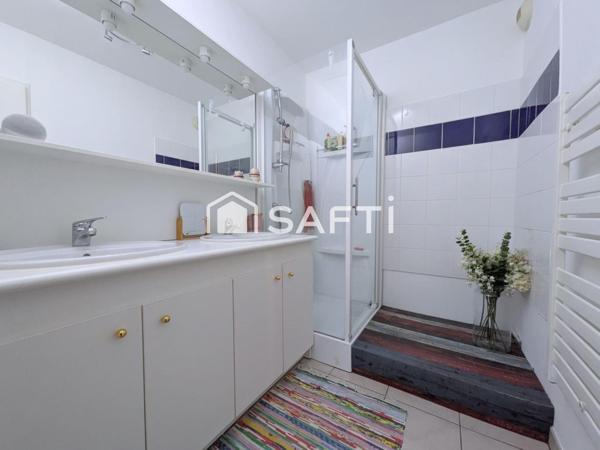 Appartement T3 avec un balcon et 2 places de parking privatives