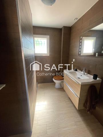 Maison avec piscine dans quartier prisé