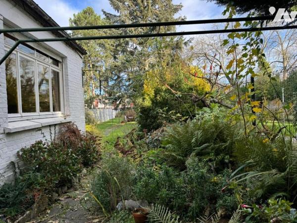 Maison de ville 4 chambres jardin et garage.