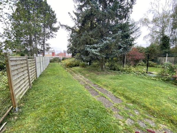 Maison de ville 4 chambres jardin et garage.