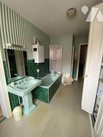 Maison de ville 4 chambres jardin et garage.