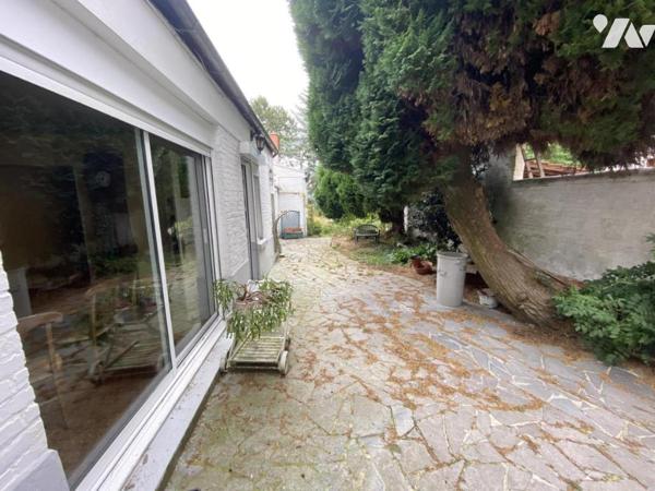 Maison de ville 4 chambres jardin et garage.