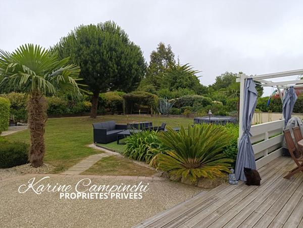 Maison familiale récente avec jardin clos, garage et plage à 10 minutes à pied