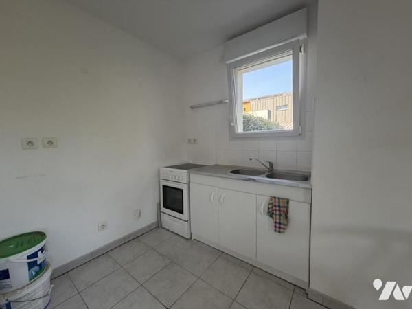 Appartement T3 avec 2 chambres et jardinet privatif