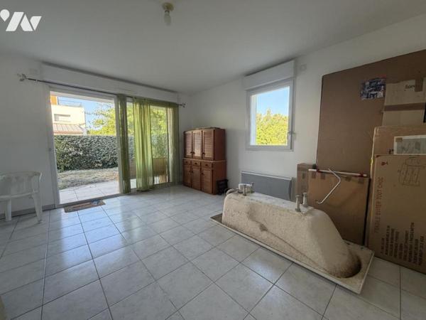 Appartement T3 avec 2 chambres et jardinet privatif