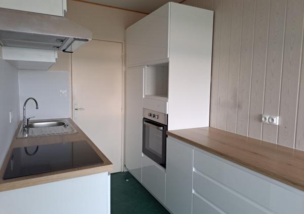 Appartement T4 de 92 m² avec balcon en étage élevé résidence de standing au calme entourée de verdure