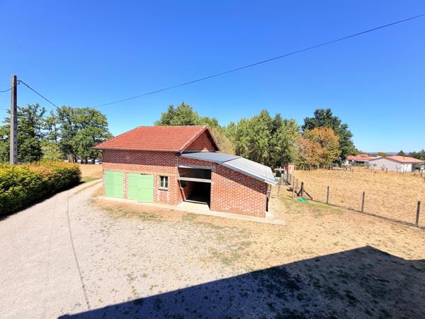 Maison avec dépendance et terrain constructible