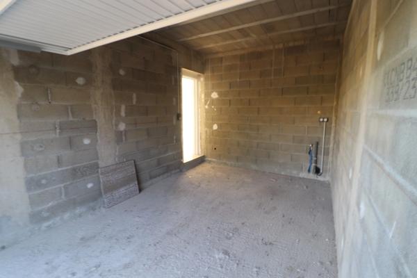 Maison individuelle avec 3 chambres, garage, terrasse et jardin