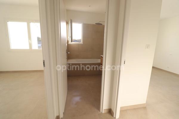 Maison individuelle avec 3 chambres, garage, terrasse et jardin