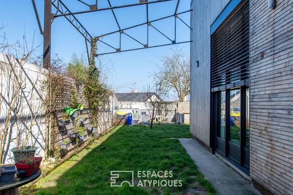 Loft industriel avec jardin et atelier