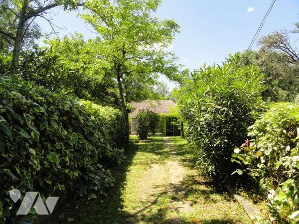 Propriété en zone naturelle   composée de 4 logements d'une superficie totale de 232.37m² . Le ...