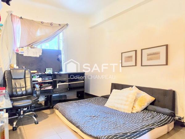 Appartement T2 de 41m2 (rdc) avec cour intérieure (Parking voiture) - Emplacement stratégique