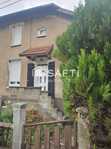 Maison mitoyenne 4 pièces,2 chambres,garage,jardin