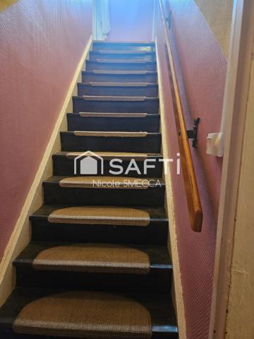 Maison mitoyenne 4 pièces,2 chambres,garage,jardin