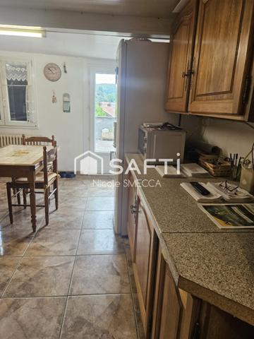 Maison mitoyenne 4 pièces,2 chambres,garage,jardin