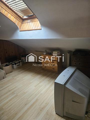 Maison mitoyenne 4 pièces,2 chambres,garage,jardin