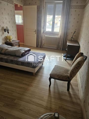 Maison mitoyenne 4 pièces,2 chambres,garage,jardin