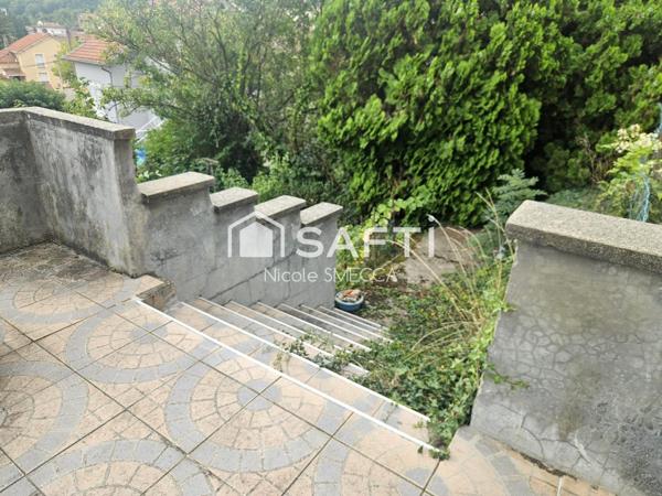 Maison mitoyenne 4 pièces,2 chambres,garage,jardin