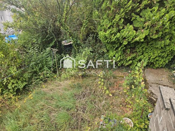 Maison mitoyenne 4 pièces,2 chambres,garage,jardin