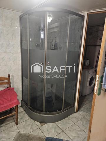 Maison mitoyenne 4 pièces,2 chambres,garage,jardin