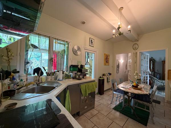 Maison de Plain-Pied  de type III avec garage quartier Cité Bel-Air.