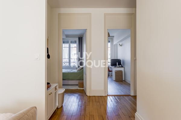 Appartement traversant - vue dégagée - ascenseur - cave