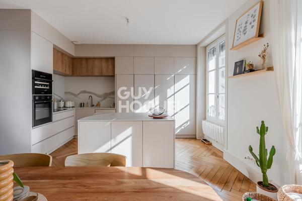 Appartement traversant - vue dégagée - ascenseur - cave