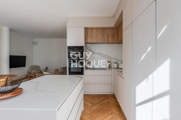 Appartement traversant - vue dégagée - ascenseur - cave