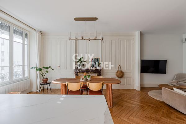 Appartement traversant - vue dégagée - ascenseur - cave