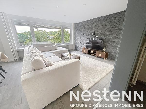 Appartement - 2 chambres - lumineux - balcon - stationnement - garage - cave - grenier