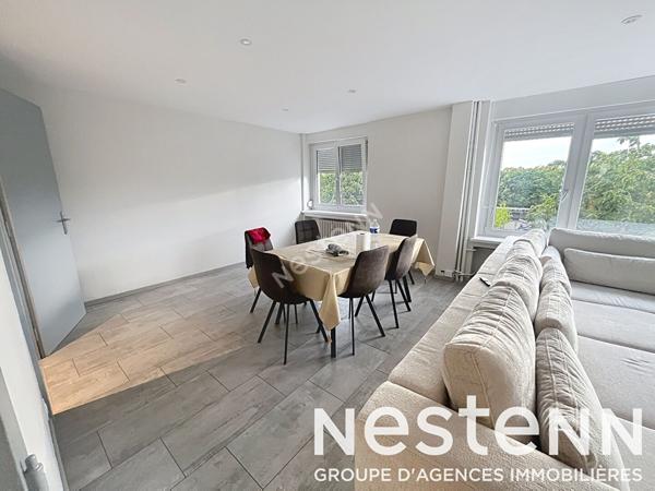 Appartement - 2 chambres - lumineux - balcon - stationnement - garage - cave - grenier