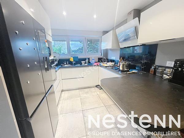 Appartement - 2 chambres - lumineux - balcon - stationnement - garage - cave - grenier