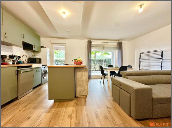 Appartement au RDC avec jardin et place de parking