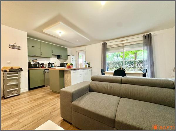 Appartement au RDC avec jardin et place de parking