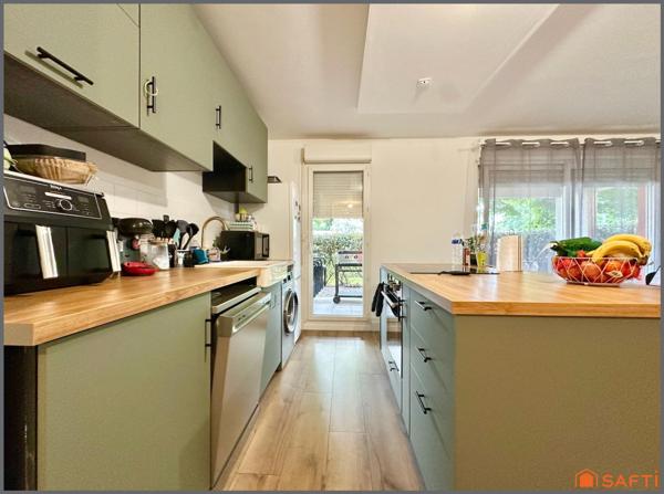 Appartement au RDC avec jardin et place de parking