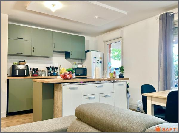 Appartement au RDC avec jardin et place de parking