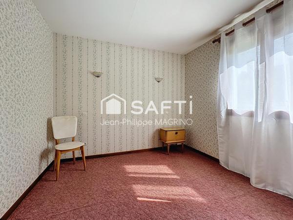 Maison de plain pied, avec garage et jardin