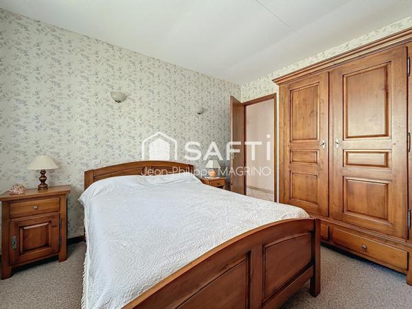 Maison de plain pied, avec garage et jardin