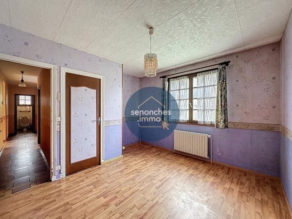 Maison à vendre à Val-au-Perche : 3 chambres, sous-sol total, terrain de 505 m² et combles de 38 m² à aménager. Potentiel et confort à découvrir !