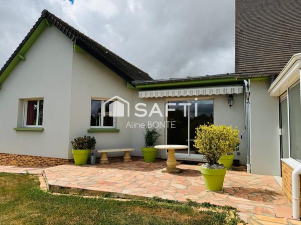 Maison sur sous-sol avec double garages et garage camping car