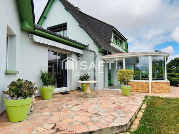 Maison sur sous-sol avec double garages et garage camping car