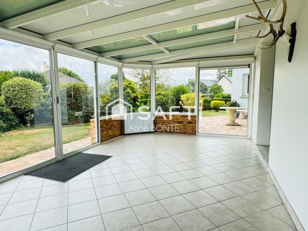 Maison sur sous-sol avec double garages et garage camping car