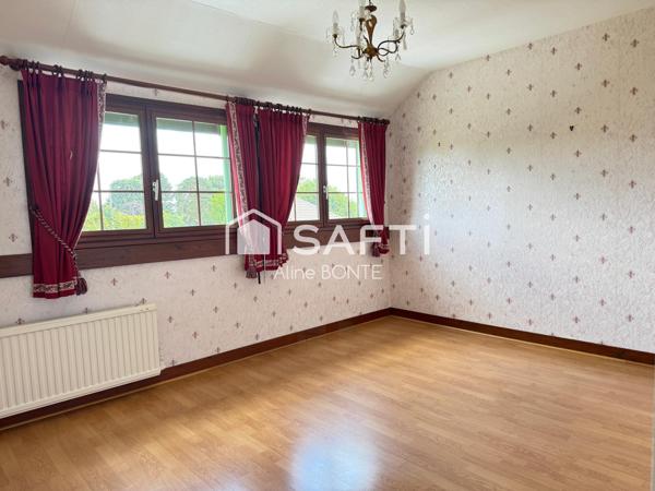 Maison sur sous-sol avec double garages et garage camping car