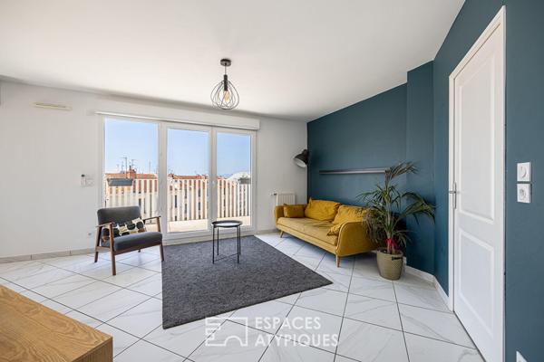 Appartement contemporain avec vue dégagée, balcon et stationnement
